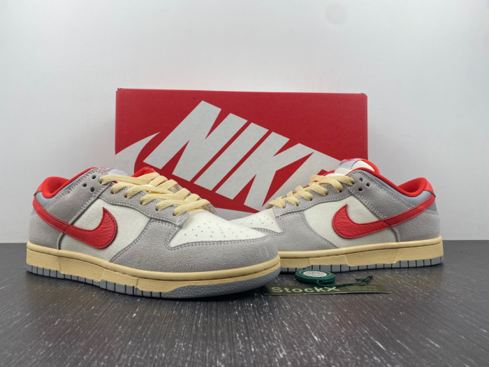 nike dunk low "grey/red" athletic department fj5429-133