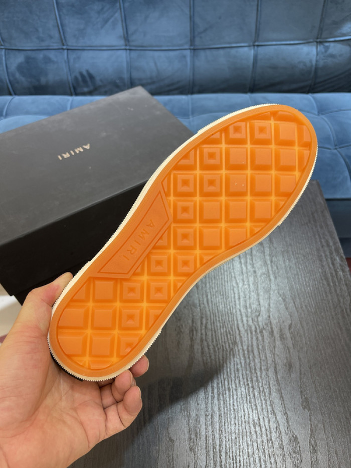 amiri* appliquéd leather and canvas sneakers