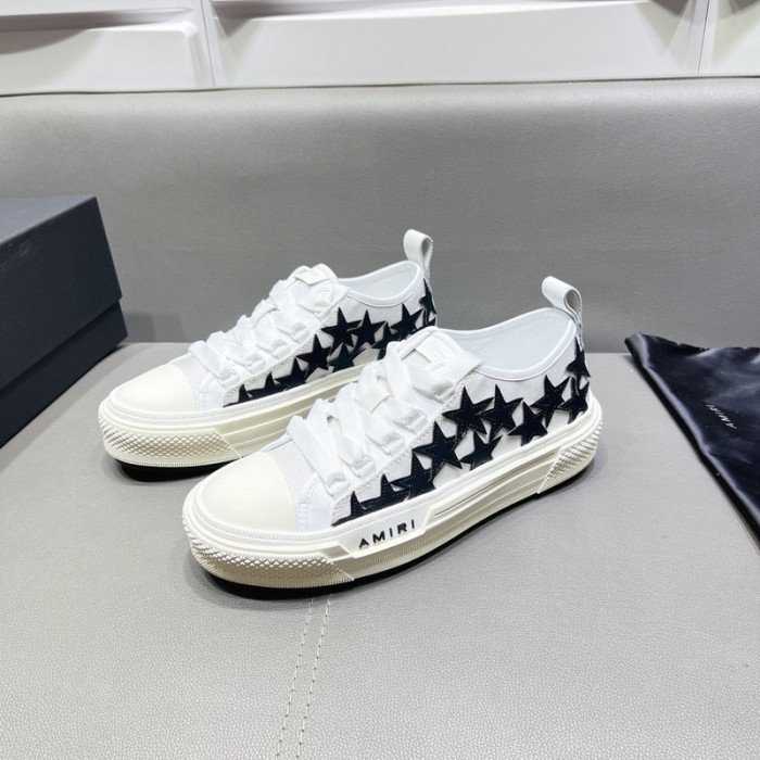 amiri* appliquéd leather and canvas sneakers